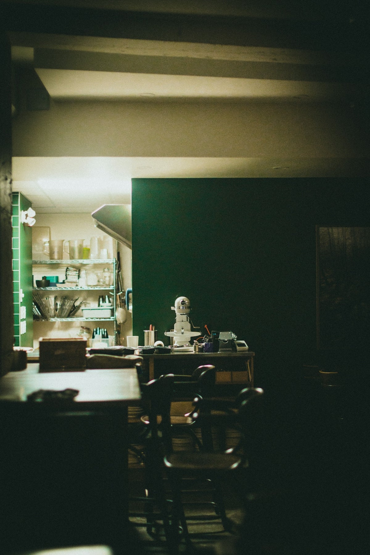 a kitchen with a cat statue